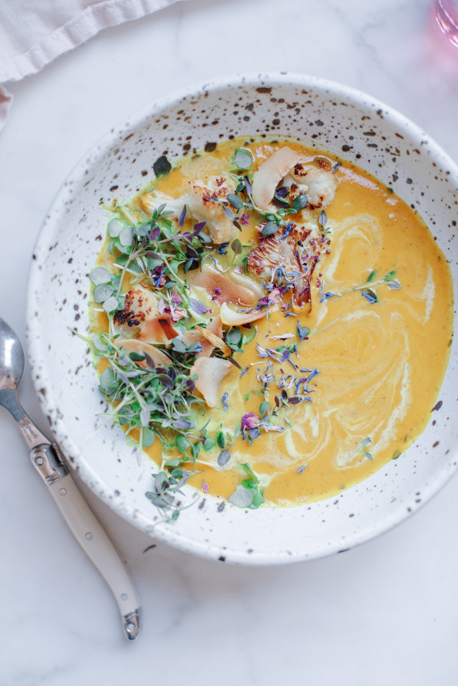 Quick and easy Healing Vegan Turmeric Coconut Milk Cauliflower Soup. This healthy, low carb detox recipe is immunity boosting and healing as well as Paleo, Keto, and Whole 30 diet friendly!