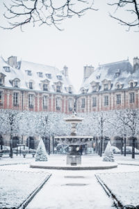 The Ultimate Paris, France Travel Guide: All the Must See Instagram, Travel Photography, Food, Cafes, Things to do, and Shopping Spot plus Travel Tips for the First Time Visitor! place des vosges snow #travel #paris #france