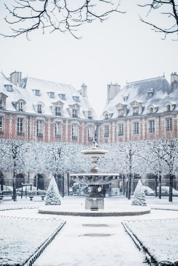 The Ultimate Paris, France Travel Guide: All the Must See Instagram, Travel Photography, Food, Cafes, Things to do, and Shopping Spot plus Travel Tips for the First Time Visitor! place des vosges snow #travel #paris #france