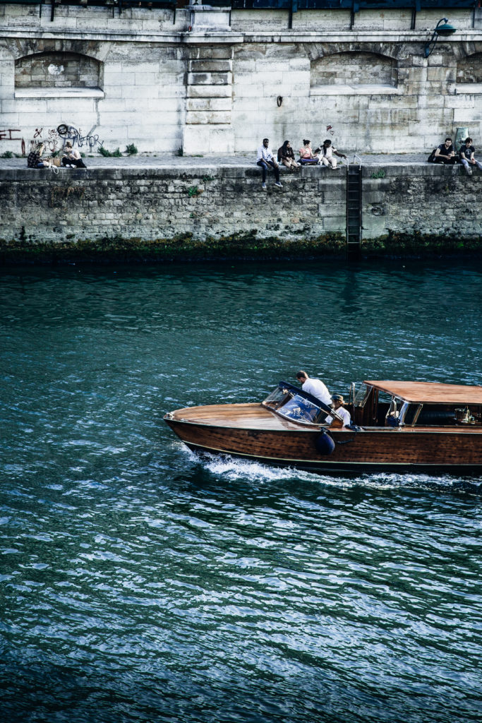 The Ultimate Paris, France Travel Guide: All the Must See Instagram, Travel Photography, Food, Cafes, Things to do, and Shopping Spot plus Travel Tips for the First Time Visitor! wooden boat on the seine #travel #paris #france