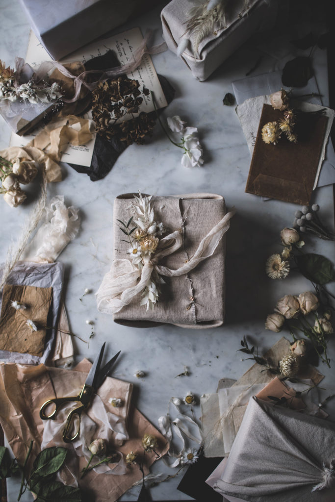 Christmas DIY: Zero waste, eco friendly linen & muslin holiday gift wrap with dried flower DIY gift toppers and hand dyed silk ribbon. | By Beth Kirby / Local Milk