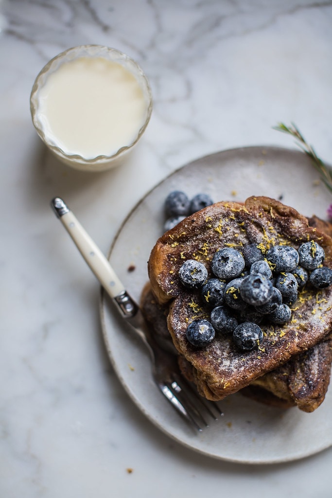 Food styling photography with Brioche French Toast with sugared blueberries and lemon zest