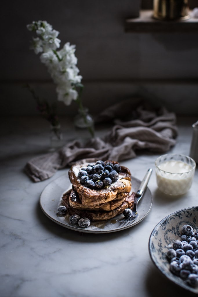 Fluffy brioche french toast with blueberries and early grey tea