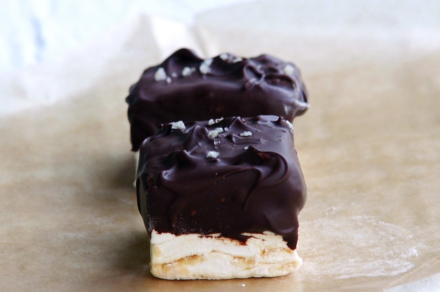 two chocolate dipped caramel marshmallow