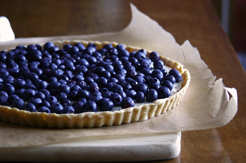 blueberry tart dining table closer
