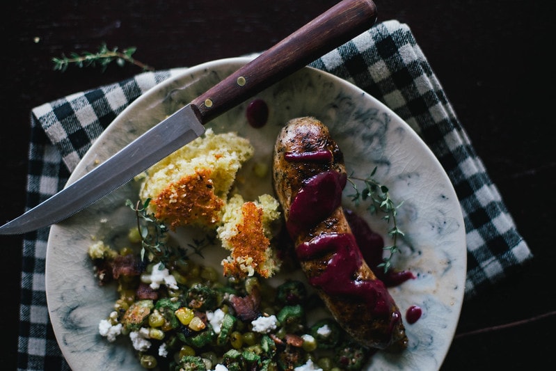 roasted corn & okra with chevre + grilled sausage in muscadine sauce